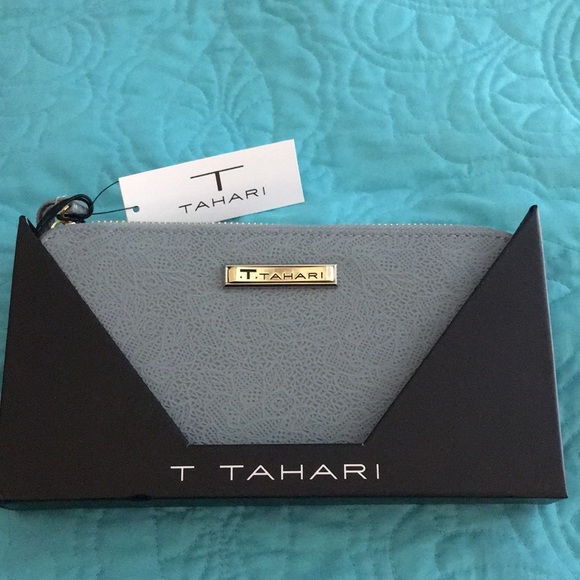 Tahari Handbags - NWT TAHARI denim blue vegan Wristlet.